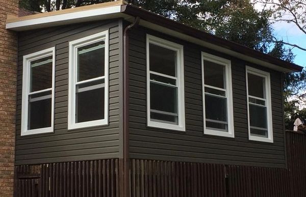 After enclosing the already existing deck, added some windows and finished it.