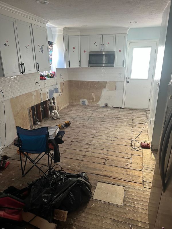 Fixing flooded homeowners kitchen