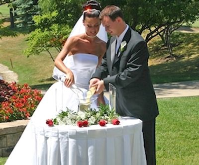Our couple is performing the sand ceremony