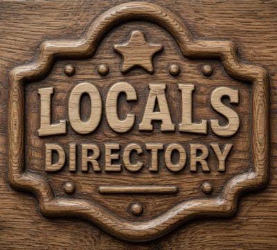 Wooden plaque reading 'Locals Directory' with a star decoration.