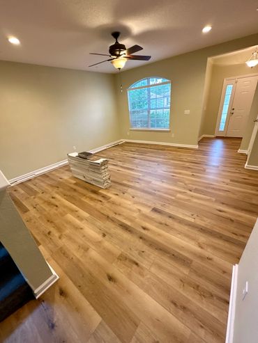 After picture of new, updated, LVP flooring.