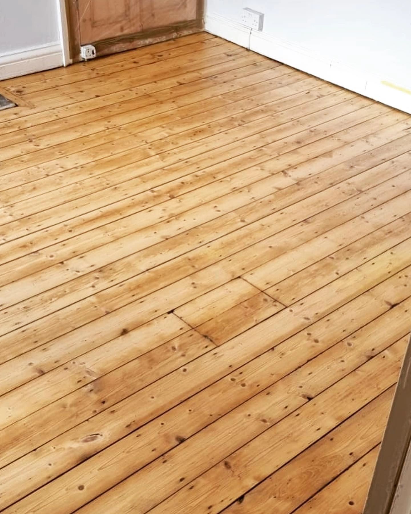 wooden floorboards after sanding and re-sealing