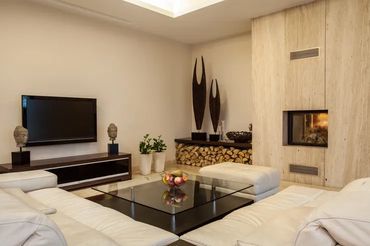Modern living room interior design with fireplace, TV wall, and minimalist styling