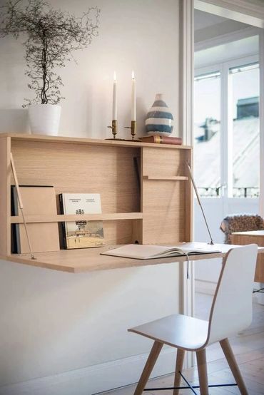 custom folding desk, optimal use of space in small room and condos. white oak design with shelving