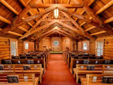 The Chapel of the Transfiguration is a historic log chapel situated within the Menors Ferry Historic District in Moose, Wyoming, near the southern entrance of Grand Teton National Park