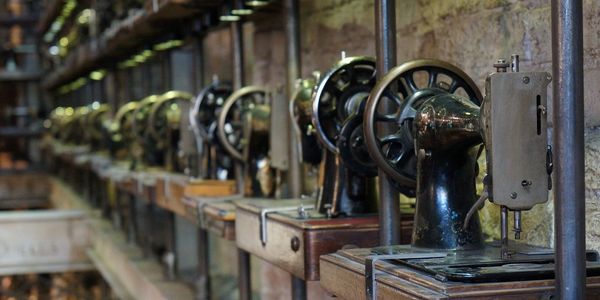 Old fashioned sewing machines for clothing alterations