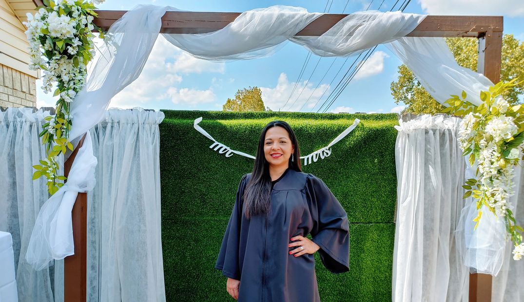 A woman giving still to camera