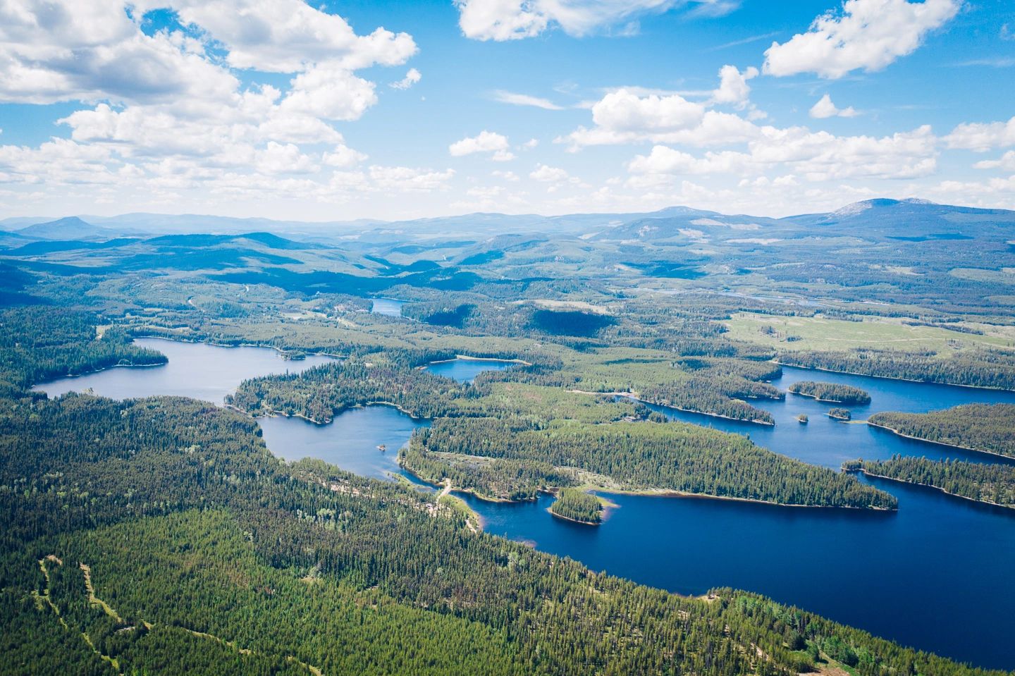 Aerial photo gallery view of McCulloch Lake Cabins and the surrounding Okanagan landscape.