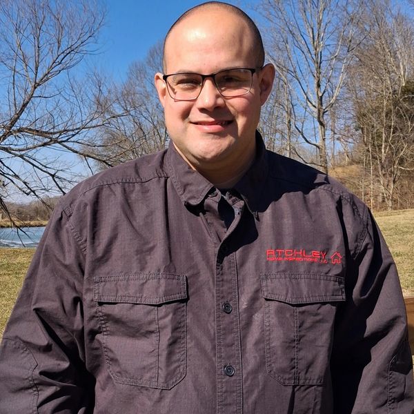 Owner Ashlin Atchley of Atchley Home Inspections LLC in company uniform.