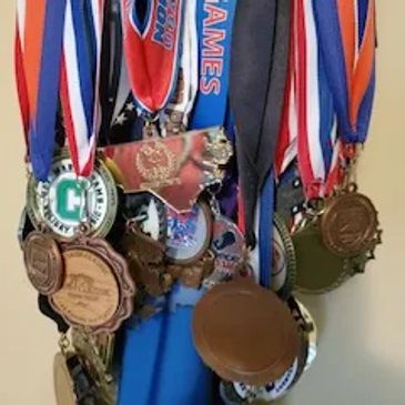 Wrestling medals display from proud parent