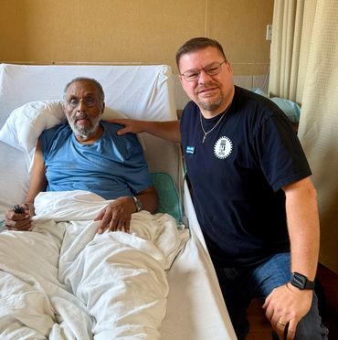 Matthew Hilley with Jessie Adams, the son of Private Curtis Adams of the Wereth 11