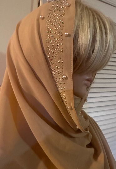 Caramel Beige hijab with pearl accents and scattered rhinestones.