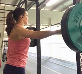 Personal trainer in Edmonton, Alberta, weight lifting