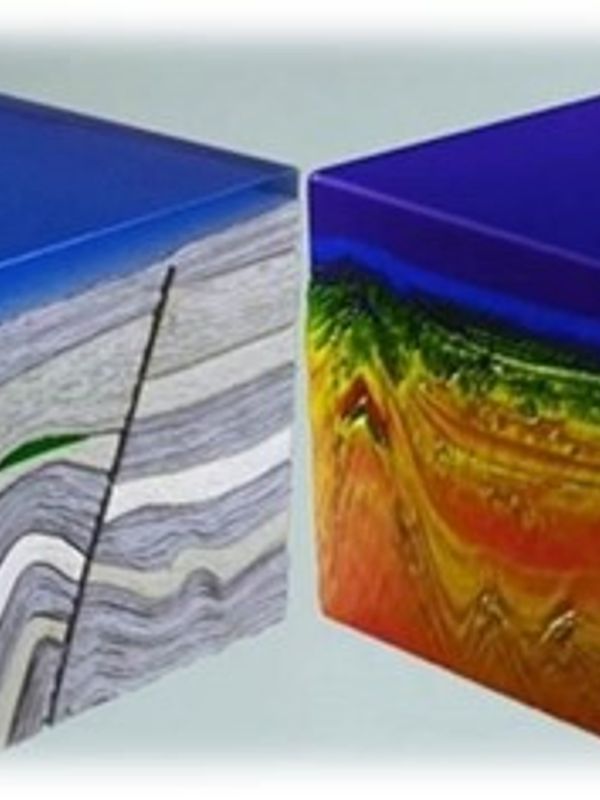 Two colorful geological cross-section models showing subsurface layers and fault lines.