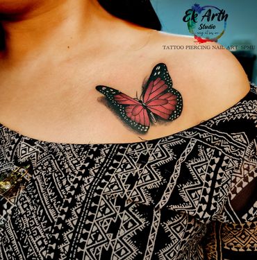 Butterfly tattoos are agelessly constant. We loved doing this 3D tattoo with red colour highlight.