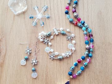 Fresh water pearls, laser etched crystals and 8mm Jewel Toned Multi Agate stones.