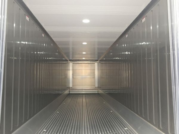 Stainless steel interior of a portable cold storage intermodal refrigerated container