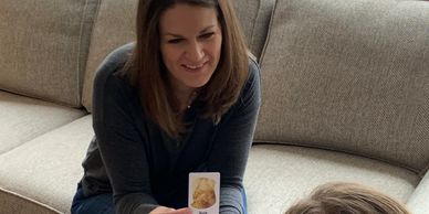 SLP showing a patient a card