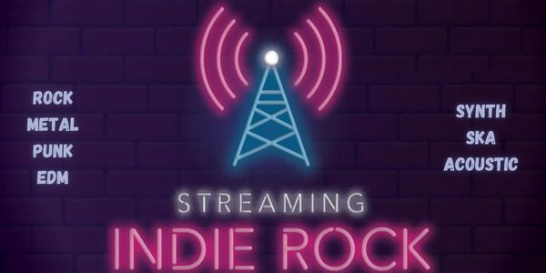 A vibrant neon sign displaying the logo for 'On The Air Tonight,' glowing brightly.