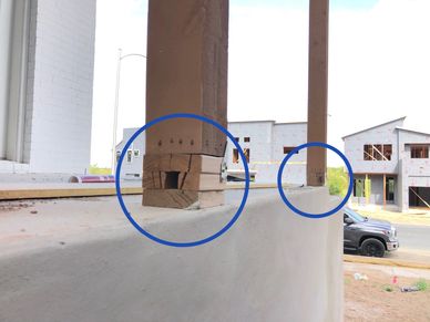 Pre-drywall phase inspection showing insufficient and damaged base for porch support columns