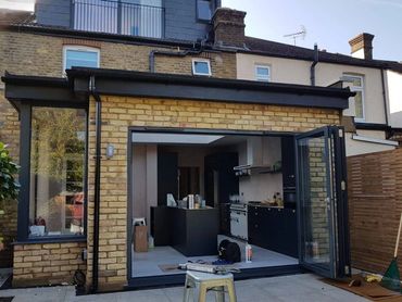 Loft and rear extension on London terraced home with modern finish and added space.