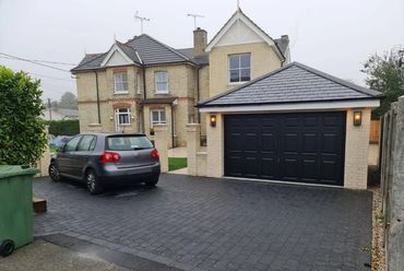 Two-storey side extension with garage in Chigwell showcasing premium build quality.