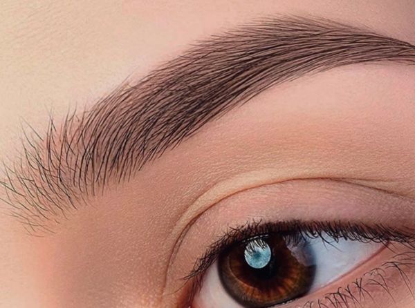 Natural brows perfected with expert shaping.