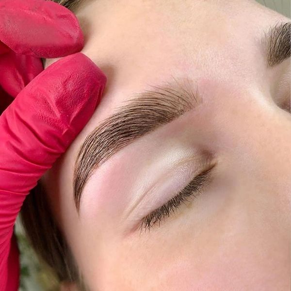 Brow lamination and shaping — full, defined brows enhanced at a beauty studio in Jupiter, FL.