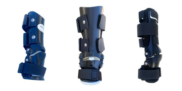 Custom carpal braces for dogs that allow paw to contact ground (no paw section.