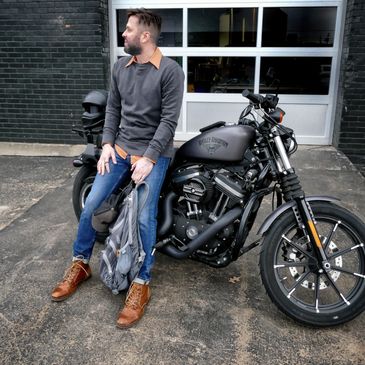Grades Of Absolute Truth
sitting on a Harley Davidson Iron 883