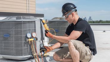 a Man working on Hvac