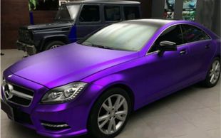 A car showing off a color change of a vinyl wrap