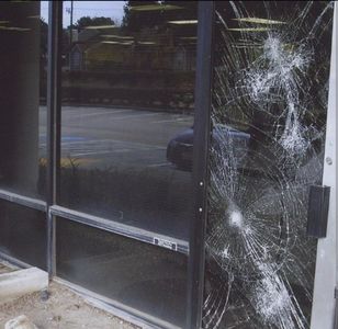 Burglar tried to break in but the safety film kept the glass together and burglar out.