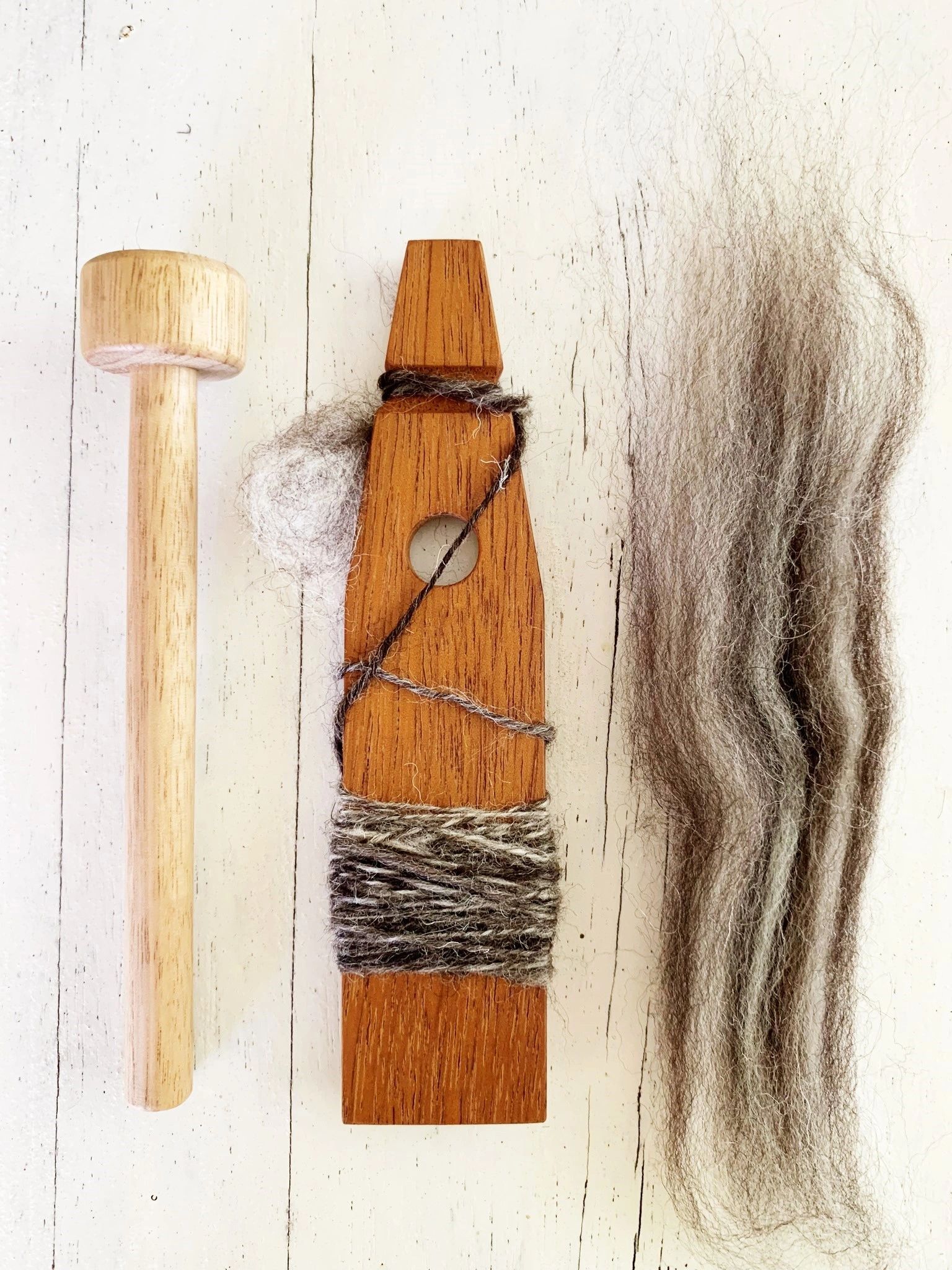 A Mayan spinner is an easy to use ancient tool for hand spinning yarn