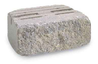 A rough concrete paver block.