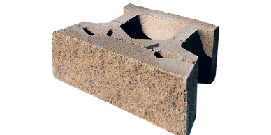A textured, brown concrete cinder block.