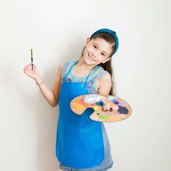 Smiling child from kids’ art class in Oro Valley.