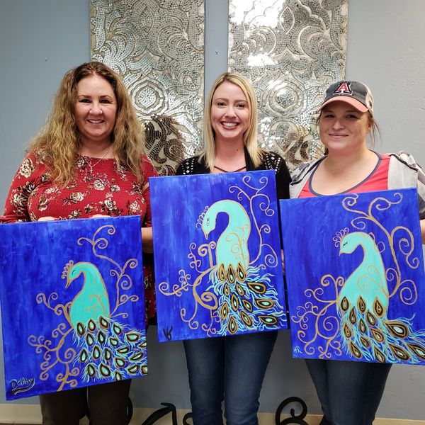 Colorful canvases created during adult painting event in Tucson area.