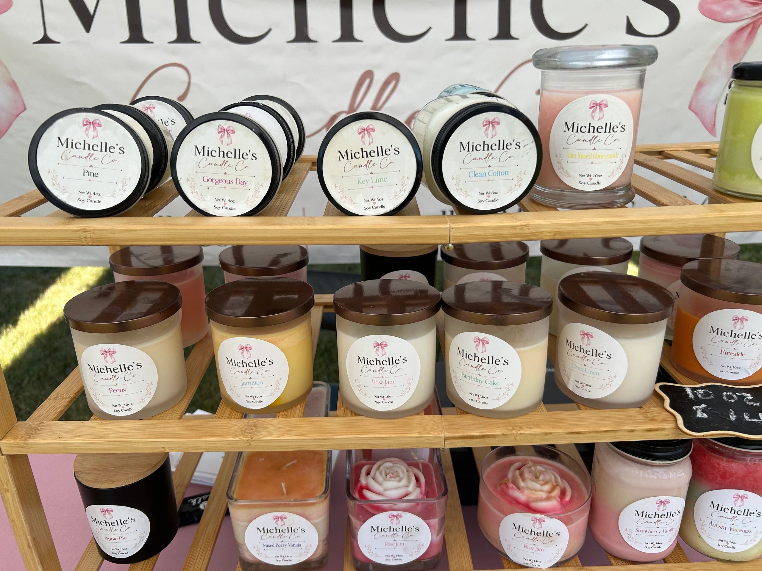 Display of Michelle's Candle Co. scented candles.