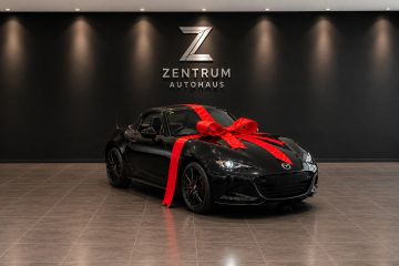 Black Mazda MX-5 sports car