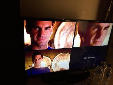 attractive man on screen for commercial