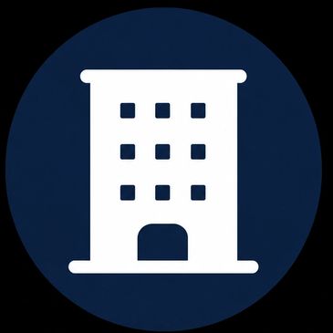 White building icon on a dark blue circular background.