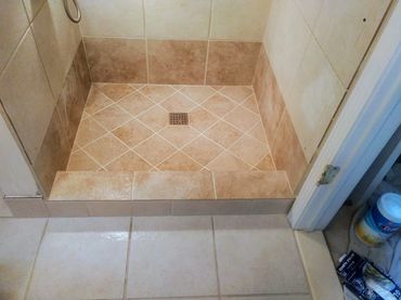 Restored waterproof shower pan, showcasing durability and functionality in pristine condition