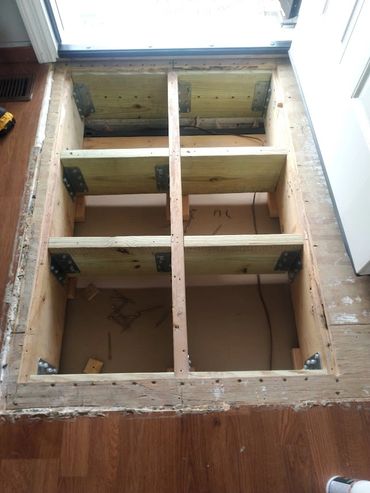 We reinforced the joists about every 12 inches to achieve a solid timber joist structure