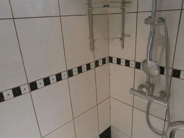 Detailed view of clean, raked tile joints prepped for new grout installation in Grosse Ile, MI.