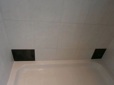 Final cleaned and polished tile floor following a professional regrouting service in Brownstown, MI.