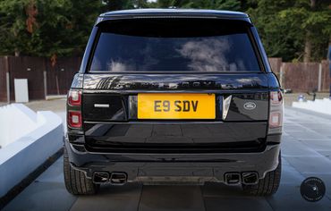 Black Range Rover Vogue for hire rear view, showcasing its modern design.