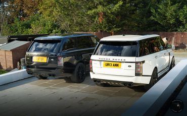 Black and white range rover vogue for hire rear view