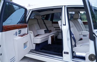 Rolls Royce Phantom 2's interior adorned with premium leather and wood accents and starlight