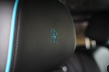 Rolls Royce Phantom 8 in a classic two-tone black and turquoise piping.